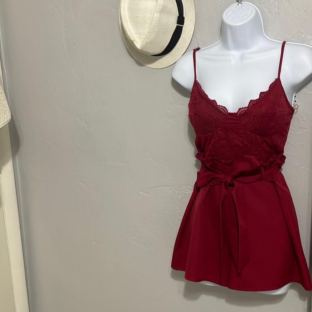 Red jumpsuit but shorts